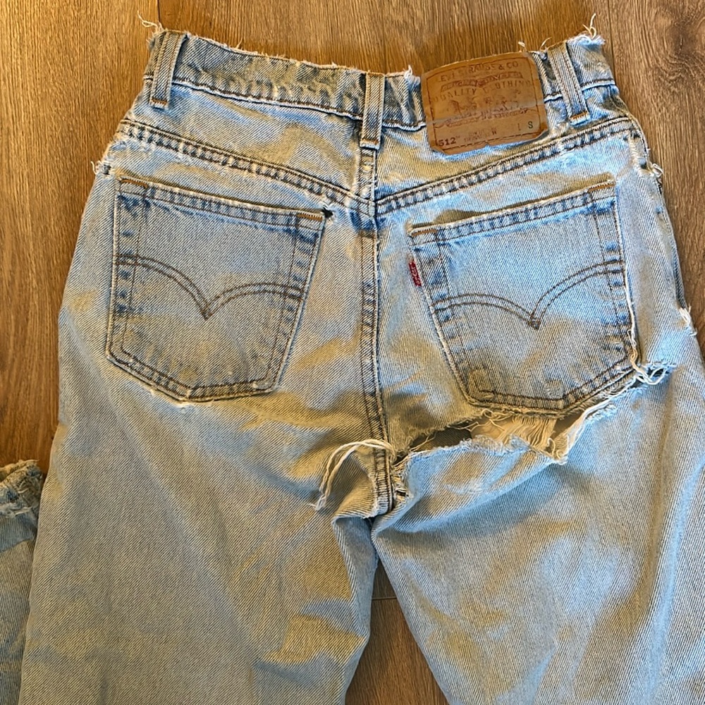 Sexy vintage Levi’s with lots of distressing size 26 waist